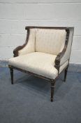 A REPRODUCTION FRENCH AMRCHAIR, with patterned cream upholstery, width 60cm x depth 52cm x height