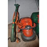 A FLYMO HV2800 HOVER VAC with grass box along with a Flymo GL350 strimmer (both PAT pass and