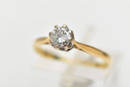 A DIAMOND SINGLE STONE RING, set with a round brilliant cut diamond, within a white eight claw