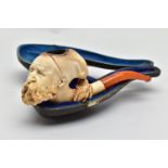 A MEERSCHAUM SMOKING PIPE, a carved meerschaum smoking pipe depicting a bearded man's face, possibly