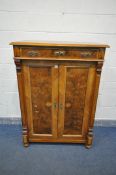 A LATE 19TH/EARLY 20TH CENTURY CONTINENTAL BURR WALNUT AND WALNUT CUPBOARD, having a single long