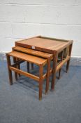 A MCINTOSH AND CO 1960'S TEAK NEST OF THREE TABLES, with a fabric magazine holder to the back of the