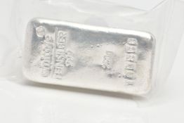 A 250 GRAM SILVER BAR, stamped 'Umicore Feinsilber 999, 250g, serial number 100868', in a sealed