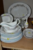 A COALPORT 'APRIL' PATTERN PART DINNER SET comprising a gravy jug and stand (stand has been badly