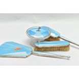 A FOUR PIECE SILVER GUILLOCHE ENAMEL VANITY SET, comprising of a hair brush, clothes brush, hand