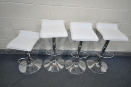 A SET OF FOUR WHITE LEATHERETTE RISE AND FALL BAR STOOLS, maximum height 85cm x minimum height