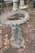 A MODERN COMPOSITE BIRD BATH in the form of a child and mother holding the bowl height 65cm