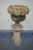 A 19TH CENTURY ALABASTER URN, modelled with open rope detail, carved acanthus leaves above rose