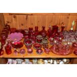 A COLLECTION OF CRANBERRY GLASS AND OTHER GLASSWARES, to include cranberry glass vases, jugs,