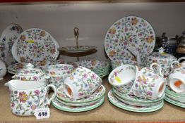 A MINTON 'HADDON HALL' PATTERN TEA AND PART DINNER SET, comprising six dinner plates (one has a