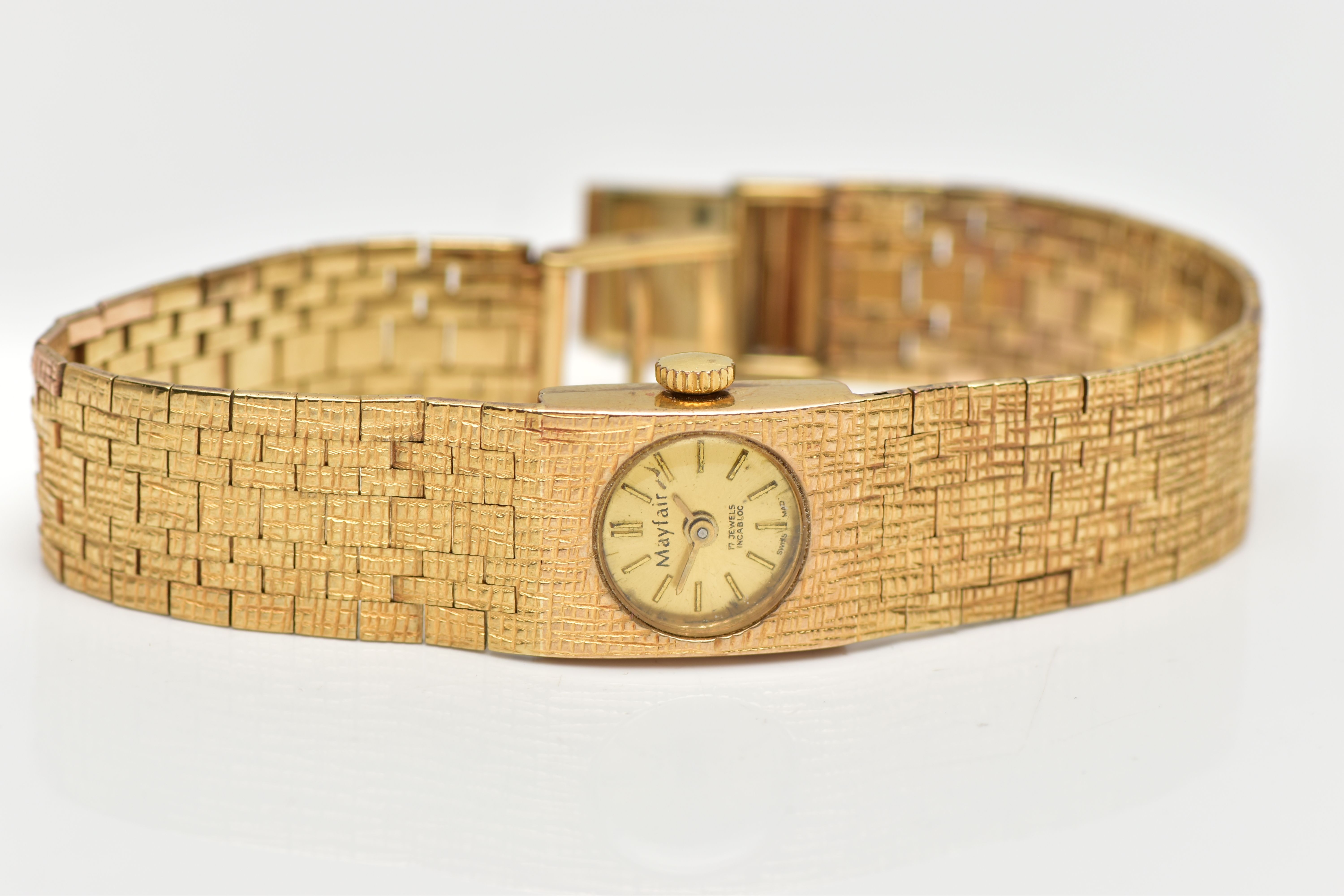 A MID 20TH CENTURY 9CT YELLOW GOLD WRISTWATCH, with circular champaign coloured dial, gold - Image 4 of 6