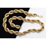 A YELLOW METAL NECKLACE, designed as a hollow rope twist chain, to the lobster clasp, stamped 14k,