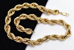 A YELLOW METAL NECKLACE, designed as a hollow rope twist chain, to the lobster clasp, stamped 14k,