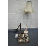 AN EARLY 20TH CENTURY MAHOGANY STANDARD LAMP, on a square base and claw feet (condition:-broken at