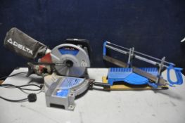 A DELTA COMPOUND SAW on pivoting base (PAT pass and working) along with a Silverline mitre saw (2)