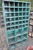 A VINTAGE METAL WORKSHOP PIDGEON HOLE SHELVING UNIT with 36 small and 9 larger apertures width