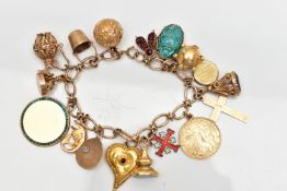 A 9CT GOLD CHARM BRACELET SUSPENDING SEVENTEEN CHARMS, the oval link chain with spring clasp,