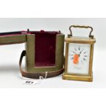 A CARRIAGE CLOCK WITH CASE, a brass carriage clock with glass viewing panels, white dial with