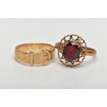 TWO YELLOW METAL RINGS, to include a buckle ring, stamped 9ct, together with a garnet single stone