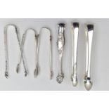 A SELECTION OF SILVER AND WHITE METAL SUGAR TONGS, a pair of plain polished silver sugar tongs,