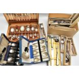 A LARGE ASSORTMENT OF CUTLERY SETS, to include two cased full sets of seven serving spoons, a