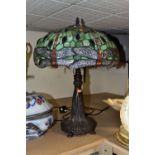 A LARGE MODERN TIFFANY STYLE LAMP, with a green, red and clear glass shade decorated with