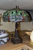 A LARGE MODERN TIFFANY STYLE LAMP, with a green, red and clear glass shade decorated with