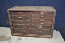 A VINTAGE ENGINEERS TOOLCHEST, wooden toolchest comprising nine draws of different sizes, to include