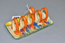 A CLARICE CLIFF CROCUS PATTERN TOAST RACK, painted with purple, blue and orange crocuses, a green