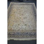 A 20TH CENTURY WOOLLEN TREE OF LIFE CARPET, with birds, flowers, leaves, animals, within a cream