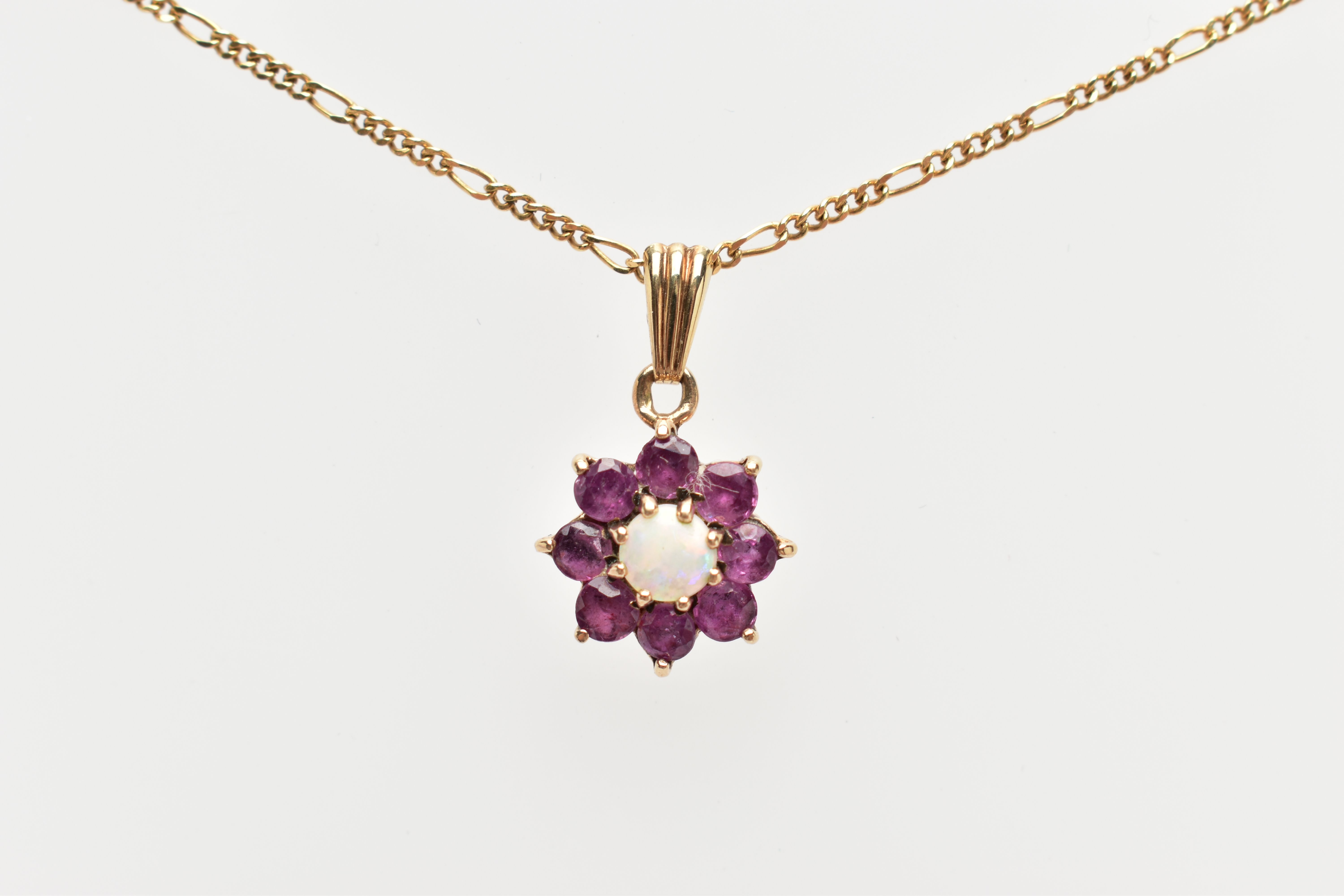A 9CT GOLD GEMSET PENDANT AND CHAIN, the flower pendant set with a central, eight claw set, opal