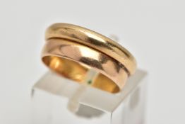 A DOUBLE BAND RING, two polished yellow gold bands soldered together, one stamped 18k, the other