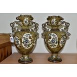 A PAIR OF LATE NINETEENTH CENTURY AUSTRIAN MAJOLICA VASES BY GERBING & STEPHAN, the twin handled