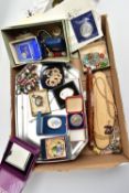 A BOX OF ASSORTED ITEMS, to include a selection of commemorative coins, an early 20th century yellow