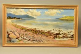 AN EXTENSIVE 20th CENTURY COASTAL LANDSCAPE, OIL ON CANVAS, the stony foreshore leads to calm open