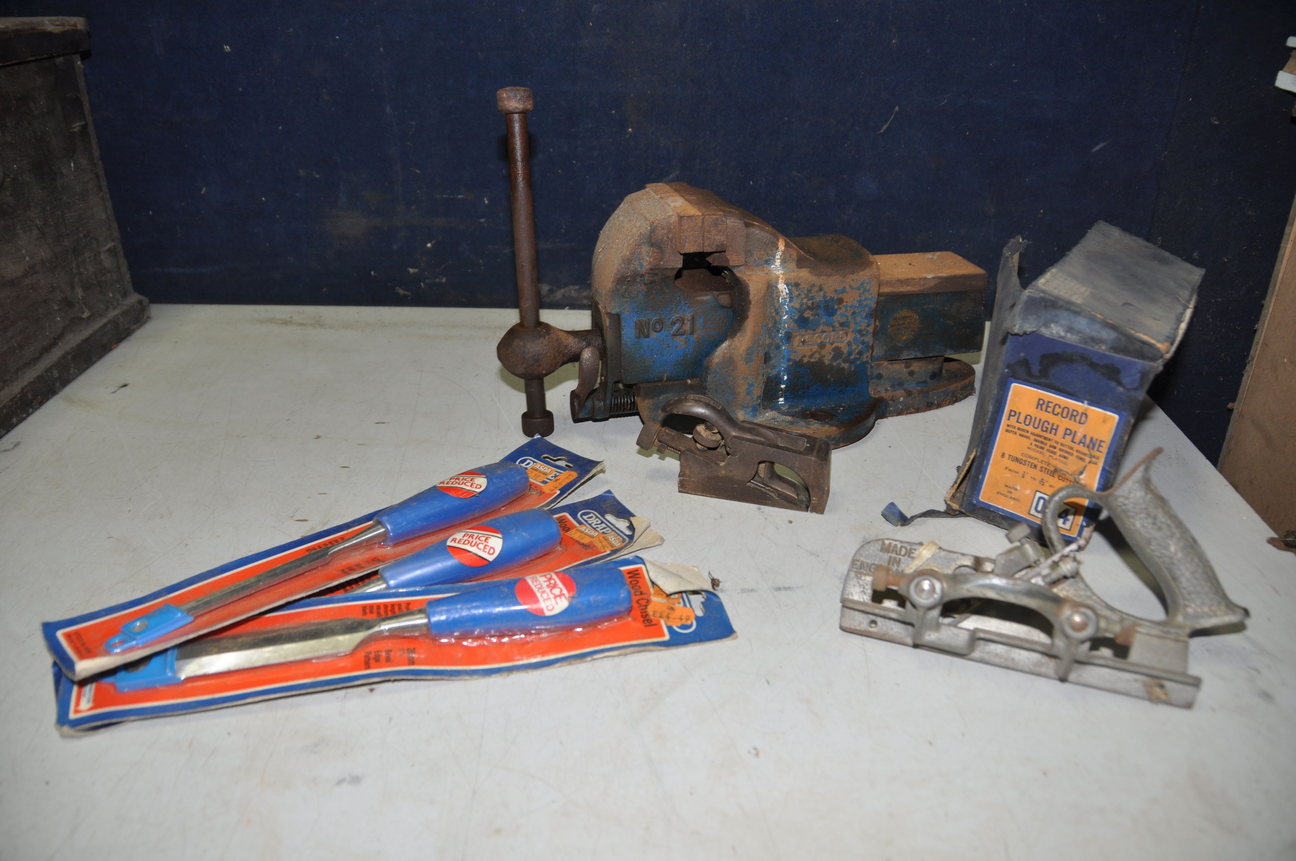 A RECORD No21 VICE along with a boxed Record 044 plough plane in original box with spare blades,