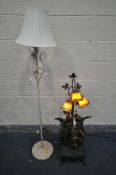 AN ART DE FRANCE RESIN FIGURAL LAMP, the three branches with orange glass shades, depicting two