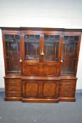 A WADE FURNITURE LTD MAHOGANY BREAKFRONT BOOKCASE, with a central cocktail section, width 207cm x