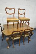 A VICTORIAN WALNUT DINING TABLE, length 132cm x depth 101cm x height 72cm, along with a set of six