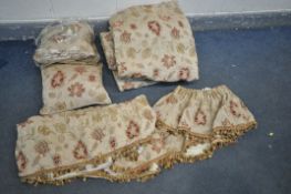 TWO PAIRS OF PAOLETTI CURTAINS, pelmets, tie backs and a pair of cushions, with floral patterns,