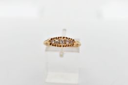 AN EDWARDIAN 18CT GOLD FIVE STONE DIAMOND RING, comprised as a series of graduated old cut diamonds,