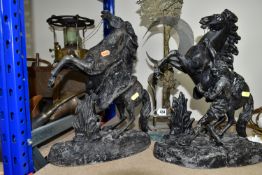 A PAIR OF SPELTER SCULPTURES TOGETHER WITH A MODERN BRASS SCULPTURE, the cast 'Marly Horses'