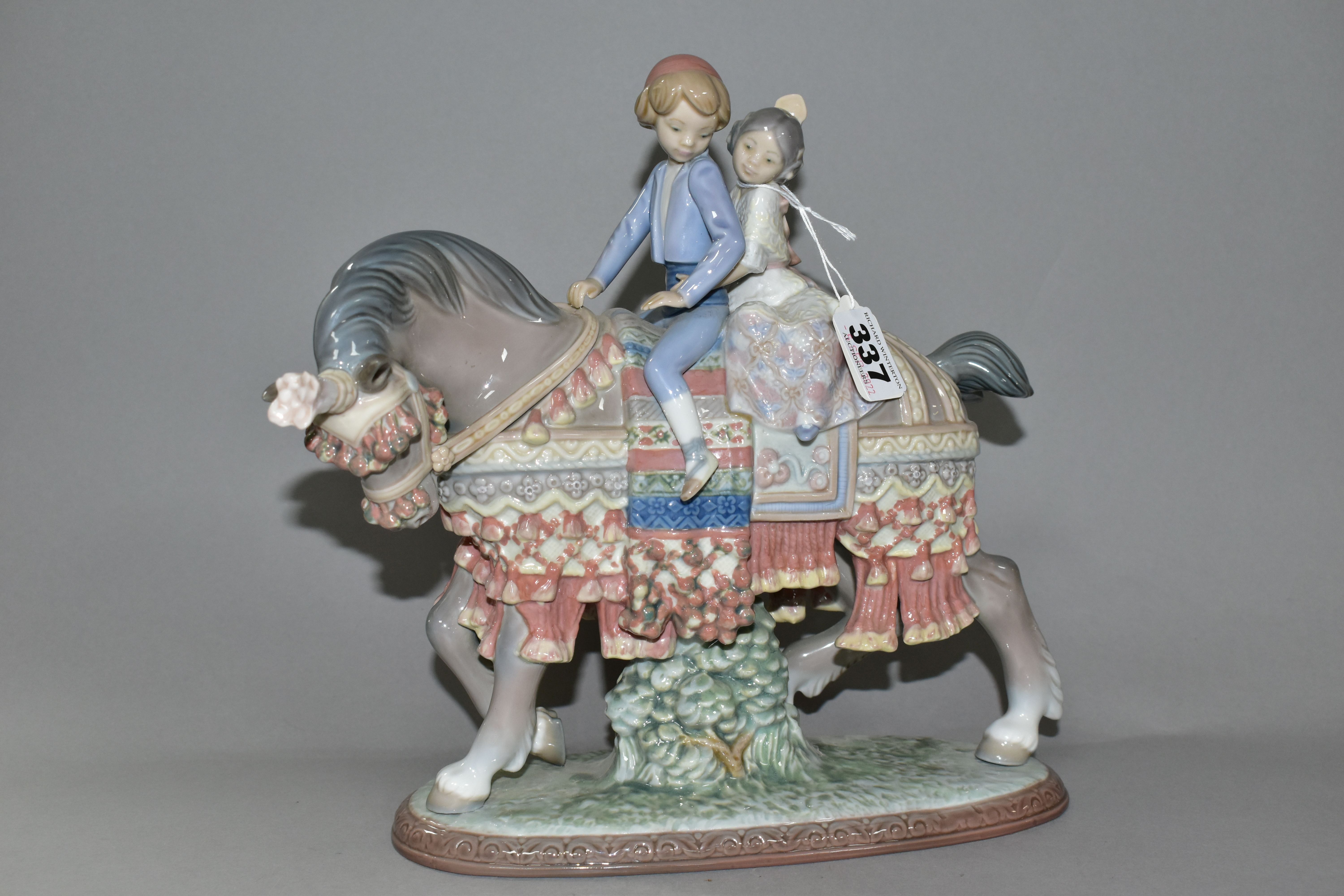 A LLADRO 'VALENCIAN CHILDREN' FIGURE GROUP, number 1489, depicting two children riding a horse,