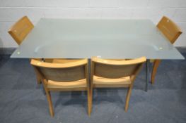 A RECTANGULAR GLASS TOPPED DINING TABLE, on a chrome base, length 160cm x depth 91cm x height