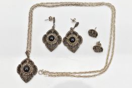 A WHITE METAL ONYX SET PENDANT NECKLACE AND EARRING SET, the pendant of an openwork diamond shape,