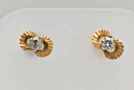 A PAIR OF DIAMOND EARRINGS, a pair of yellow metal stud earrings, each earring prong set with a