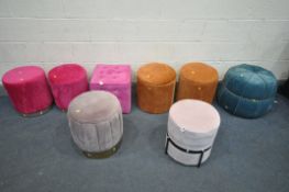A SELECTION OF POUFFES/STOOLS, to include two circular pink pouffe's, with metal rim, a cubed