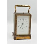 A 'HOWELL JAMES & CO' REPEATING CARRIAGE CLOCK, brass carriage clock, white dial, Roman numerals,