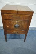 A GEORGE III MAHOGANY GENTLEMANS WASHSTAND, with a double fold over top enclosing a fitted interior,