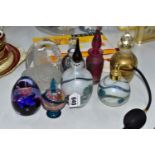 A COLLECTION OF DECORATIVE GLASS PERFUME BOTTLES, REFERENCE BOOKS AND TWO PAPERWEIGHTS, including an